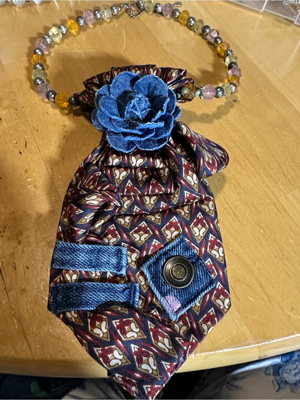 Handmade 100% silk refurbished tie into a unique addition to any outfit.